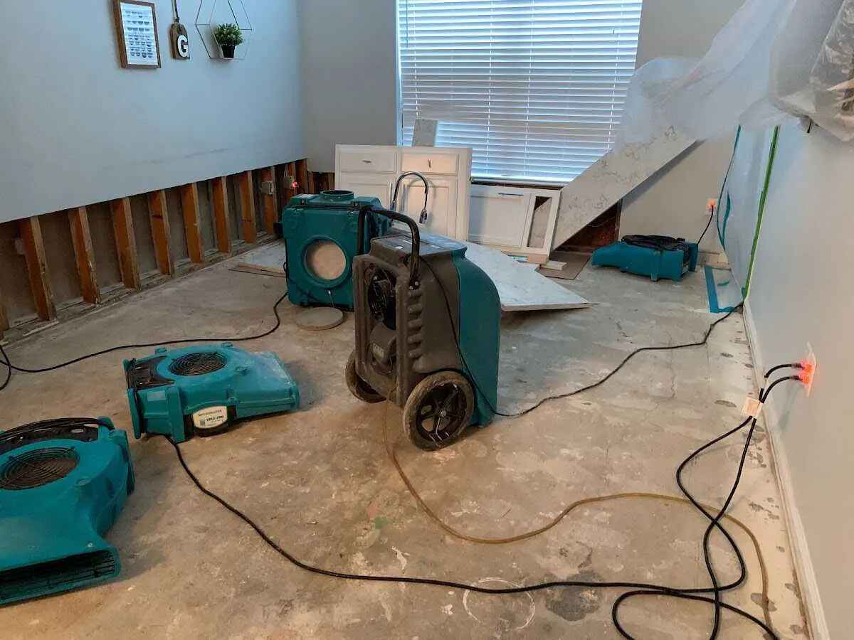 Dehumidifier in flood-cut room for Water Damage Restoration in Midway City